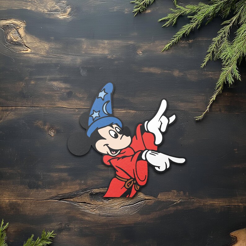 May include: A colorful wooden cutout of Mickey Mouse in a sorcerer's outfit. Mickey is wearing a blue hat with stars and a crescent moon, a red robe, and white gloves. The cutout is on a dark wood background.