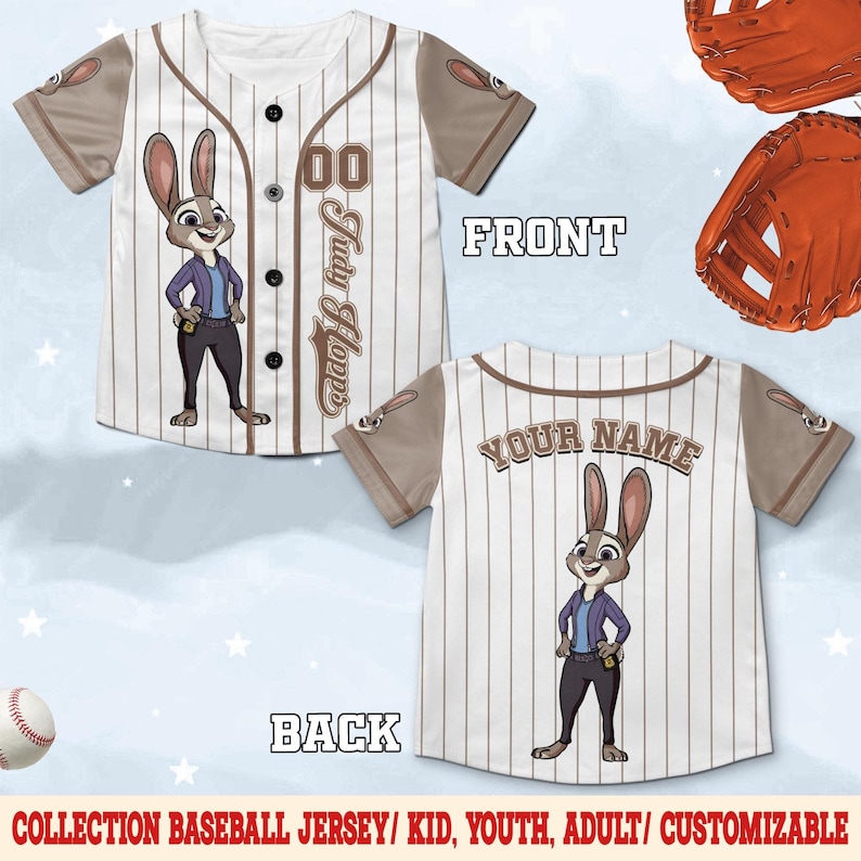 May include: A baseball jersey with a cartoon image of Judy Hopps. The front of the jersey has the number "00" and the name "Judy Hopps". The back of the jersey has the text "YOUR NAME". The jersey is white with brown sleeves and pinstripes.