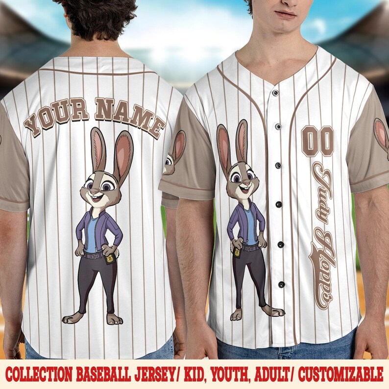 May include: White baseball jersey with brown pinstripes, featuring a cartoon rabbit character. The jersey has the text "YOUR NAME" on the back and "Judy Hopps" on the front. The sleeves are brown, and the jersey has black buttons.