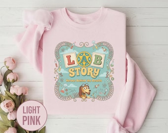Lab Week 2026 Lab Story Sweatshirt, Slinky Dog Inspired Medical Tech JCTE13