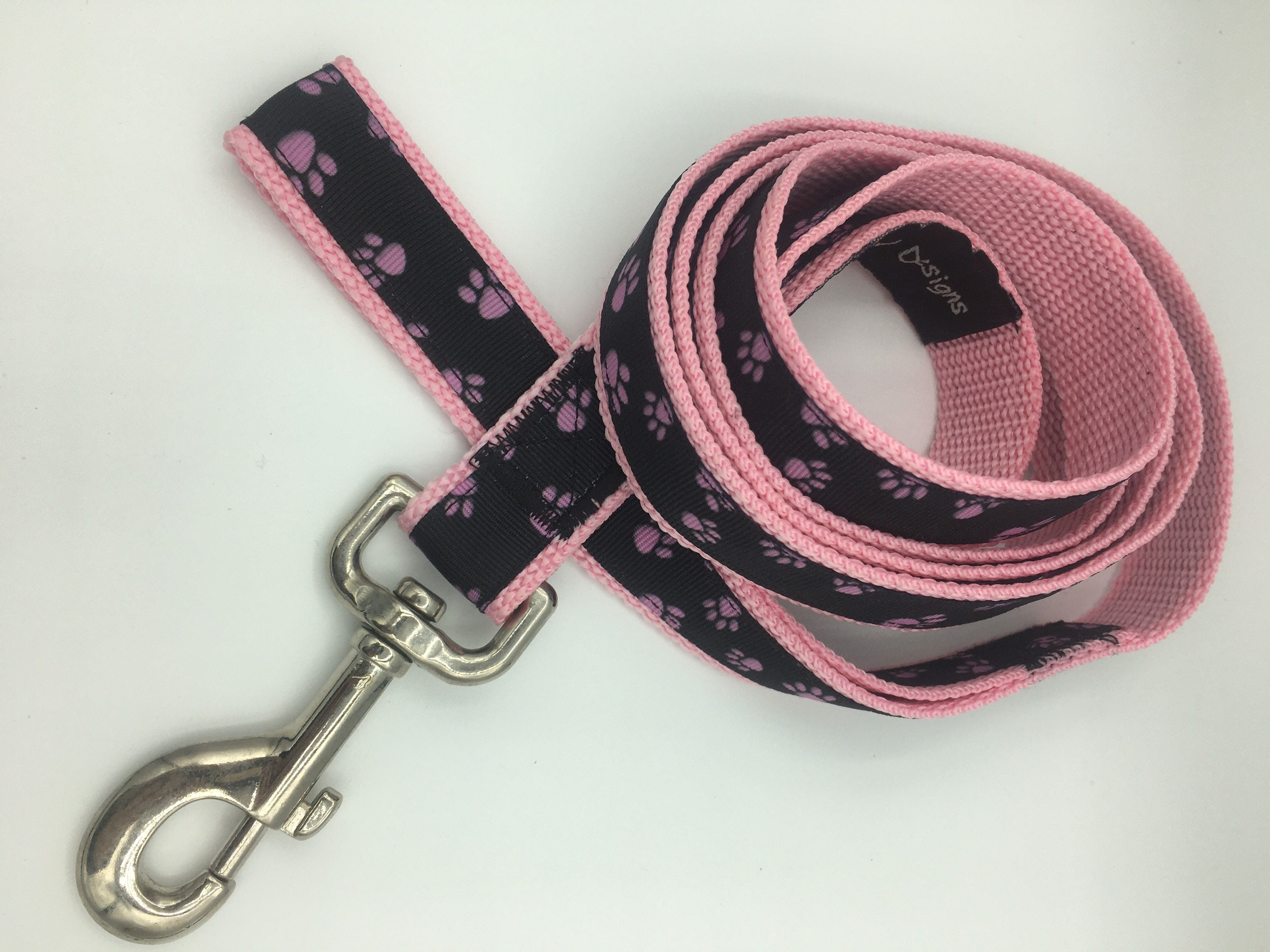 Pink dog leash with pretty pink paws on a black ribbon over Etsy