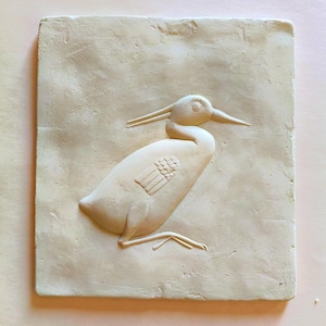 Réplica de un relieve del antiguo Egipto con una garza / Escultura mural de yeso mentolado