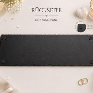 Rückseite der Schieferplatte mit vier Filzgleitern zum Schutz von Möbeln