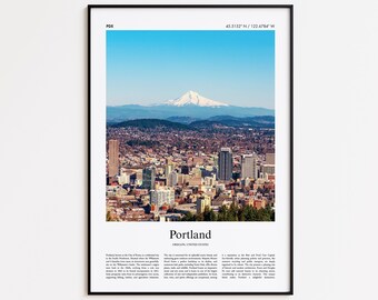 May include: A framed print featuring a scenic view of Portland, Oregon, with a snow-capped mountain in the background. The city skyline is visible, with text at the top and bottom, including the city name and coordinates.