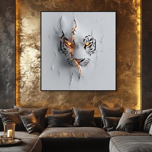 May include: A white tiger's face with glowing orange eyes is depicted in a 3D style, appearing to break through a cracked white wall. The tiger's face is centered in the image, with the cracks radiating outward.