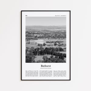 May include: Black and white framed print of Bathurst, New South Wales, Australia. The print includes the city's name and coordinates. The image shows a landscape view of the city with trees and buildings.