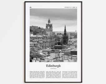 May include: Black and white framed print of Edinburgh, Scotland. The image features a cityscape with a prominent clock tower and a tall, slender spire. The word "Edinburgh" is printed at the bottom.
