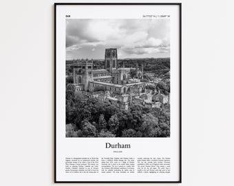 May include: Monochrome framed print of Durham Cathedral, England. The image shows the cathedral and surrounding buildings, with text at the top and bottom. The photograph is set against a cloudy sky, capturing the architectural details.