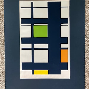 May include: Abstract geometric art print with a black, white, green, yellow, and orange color scheme. The print features a grid pattern with overlapping squares and rectangles.