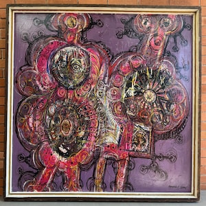 May include: Abstract painting with a purple background and a complex design of pink, red, yellow, and black shapes. The artwork is framed in a wooden frame with a gold inner border. Signed by Ronald D. Olson.