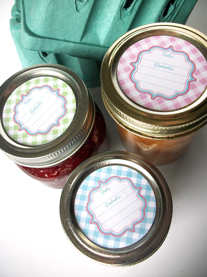 May include: Three glass jars with lids, each with a different coloured gingham patterned label. The labels have a white frame with the words "Date:" and "Contents:" printed on them.