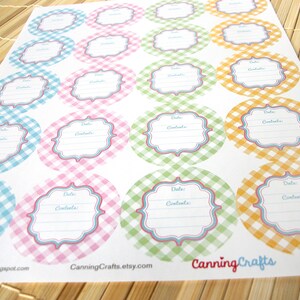 May include: A sheet of 24 round, printable canning jar labels with a gingham pattern in pink, blue, green, and yellow. The labels have a space for "Date" and "Contents" and the text "Canning Crafts" is printed at the bottom.