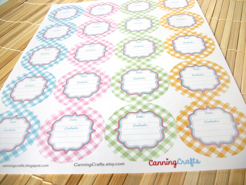 May include: A sheet of 24 round, printable canning jar labels with a gingham pattern in pink, blue, green, and yellow. The labels have a space for "Date" and "Contents" and the text "Canning Crafts" is printed at the bottom.