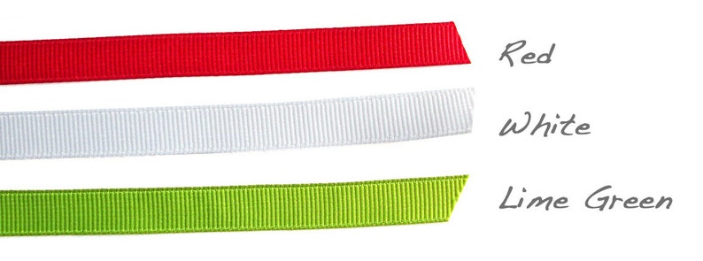 Three ribbons in red, white, and lime green are displayed against a white background. The red ribbon is at the top, followed by a white ribbon, and a lime green ribbon at the bottom. The text "Red", "White", and "Lime Green" are written next to each ribbon.