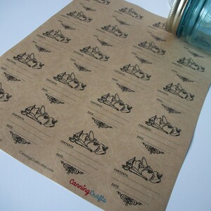 May include: A sheet of brown paper with round, white, sticker labels. Each label has a black and white illustration of vegetables and the words "CONTENTS" and "DATE" with blank lines for writing.