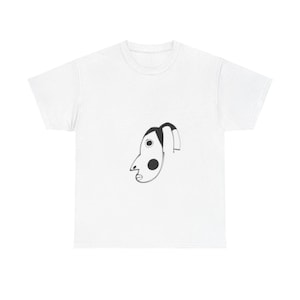 May include: White t-shirt with a black and white abstract face design.