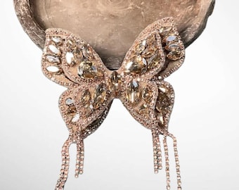 Presilha de cabelo em forma de borboleta com strass cor champanhe