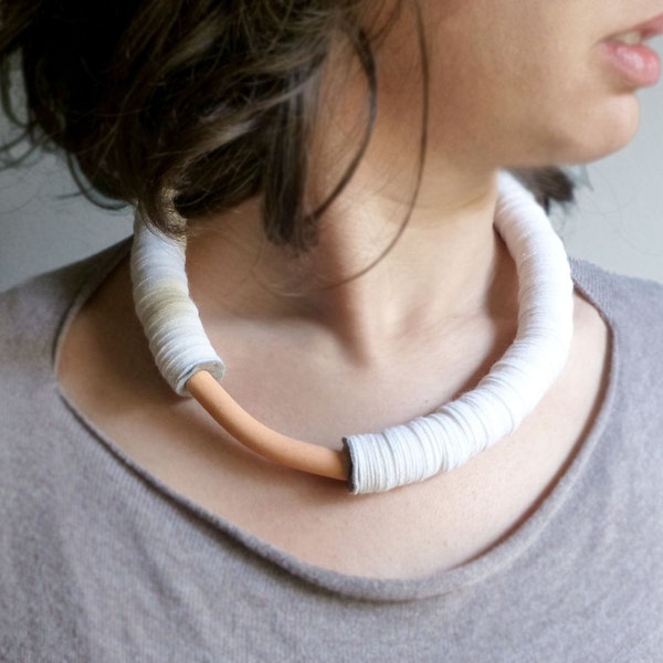 white felt geometric bold necklace with a salmon pink ceramic curve bead - contemporary jewelry