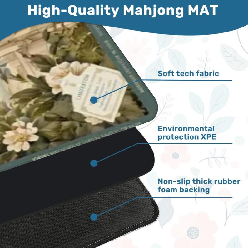 May include: A rectangular Mahjong mat featuring a floral pattern with white flowers and green leaves. The mat is composed of three layers: a soft tech fabric top, an environmental protection XPE middle layer, and a non-slip thick rubber foam backing.