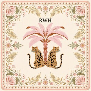 May include: A square scarf featuring a cream background with a border of pink flowers and green leaves. In the center, two spotted leopards sit back-to-back under a pink palm tree. The letters RWH are printed in black above the palm tree.