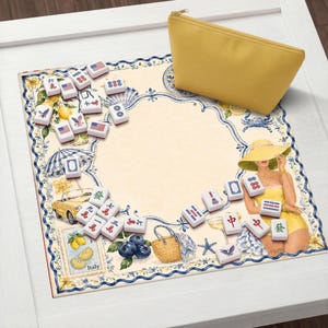 May include: A yellow zippered pouch rests on a decorative mat with a beach theme. The mat features illustrations of lemons, a convertible car, and a woman in a yellow dress. Scattered around are white Mahjong tiles with red and blue markings.