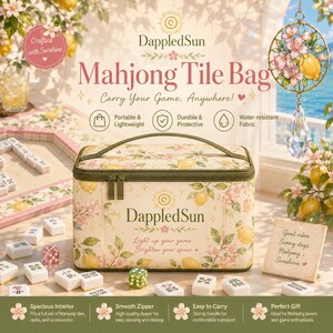 May include: A beige Mahjong Tile Bag with a floral and lemon pattern, the text "DappledSun" and "Mahjong Tile Bag" is visible. The bag has a handle and a zipper. The image also shows Mahjong tiles and dice.