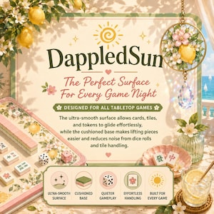 May include: A tabletop game surface with the text "DappledSun" and "The Perfect Surface For Every Game Night." The surface has a floral and lemon design, with dice and game tiles. The image also includes a glass of lemonade and a decorative hanging ornament.