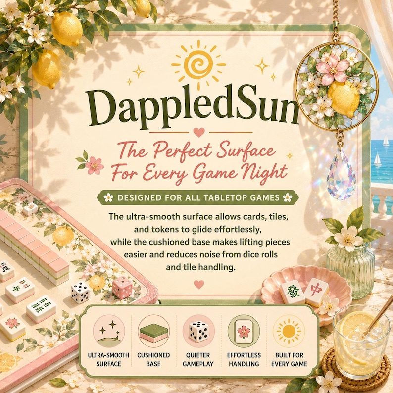 May include: A tabletop game surface with the text "DappledSun" and "The Perfect Surface For Every Game Night." The surface has a floral and lemon design, with dice and game tiles. The image also includes a glass of lemonade and a decorative hanging ornament.