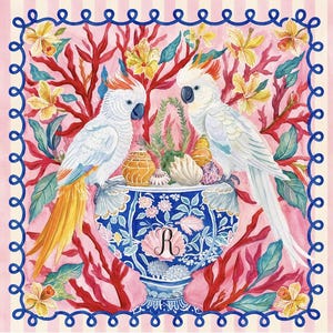 May include: Watercolor illustration featuring two white cockatoos perched on a blue and white vase filled with seashells. The vase is set against a pink background with coral and floral elements, framed by a blue border.