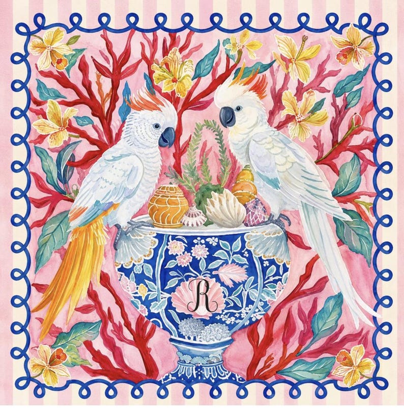 May include: Watercolor illustration featuring two white cockatoos perched on a blue and white vase filled with seashells. The vase is set against a pink background with coral and floral elements, framed by a blue border.