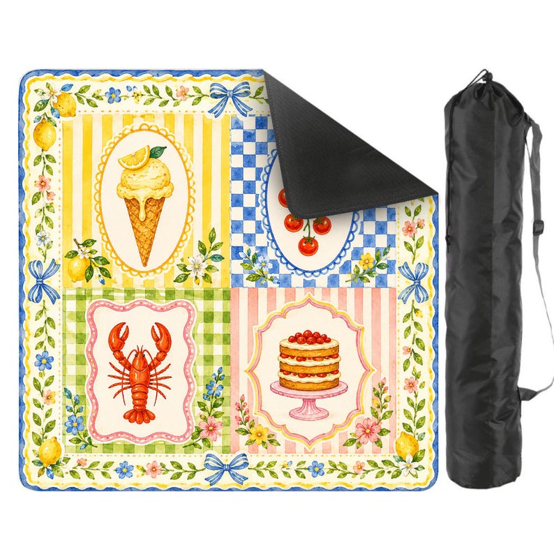 May include: A colorful picnic blanket with a whimsical design featuring ice cream, cherries, a lobster, and a cake. The blanket has a black underside and comes with a black carrying bag. The design includes yellow, blue, green, and pink patterns.
