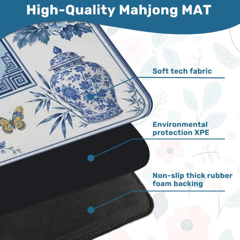 K&ouml;nnte beinhalten: Hochwertige Mahjong-Matte mit blau-wei&szlig;em Blumendesign. Die Matte verf&uuml;gt &uuml;ber ein weiches Tech-Gewebe, Umweltschutz XPE und eine rutschfeste, dicke Schaumstoffr&uuml;cken. Die oberste Schicht hat ein blau-wei&szlig;es Blumendesign mit einem Schmetterling.