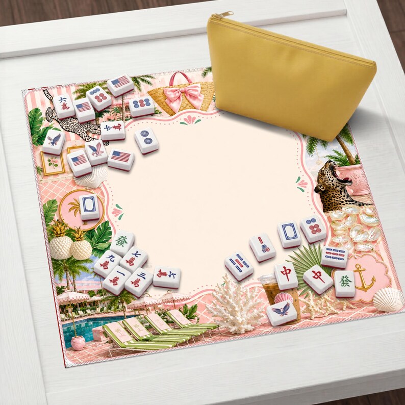 May include: A yellow zippered pouch rests on a decorative mat featuring a tropical scene with a pool, lounge chairs, and a leopard. The mat is surrounded by mahjong tiles with various symbols and American flag designs.