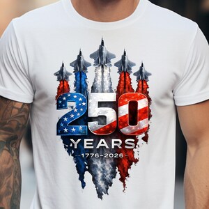 Patriotic fighter jet graphic featuring red white and blue smoke trails.
