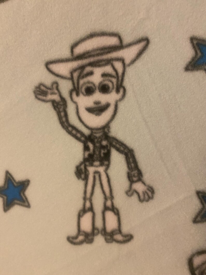 May include: A white and black cartoon illustration of Woody from Toy Story, wearing a cowboy hat and a sheriff's badge. He is waving with his right hand and smiling. The background is a light blue with blue stars.
