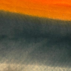 May include: Abstract watercolor painting with a gradient of orange, yellow, blue, and gray.