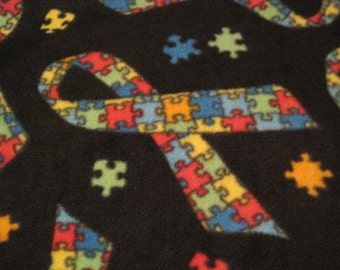 Autism Logo Puzzle Pieces in a Ribbon with Green Couch Throw - Ready to Ship Now