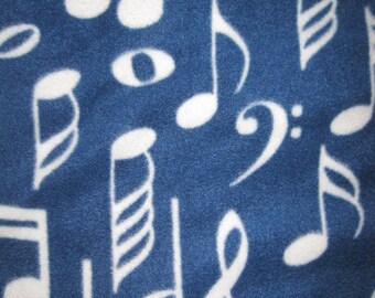 Musical Notes in White on Navy Blue with Red Blanket