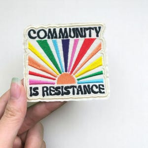 Community Is Resistance Iron On Patch – Rainbow Sunrise Embroidered Applique for Jackets, Bags & DIY Clothes