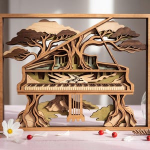 May include: A multi-layered wooden art piece featuring a grand piano integrated with tree branches and roots. The design incorporates light and dark wood tones, showcasing a keyboard, a central path, and canopy-like foliage within a rectangular frame.