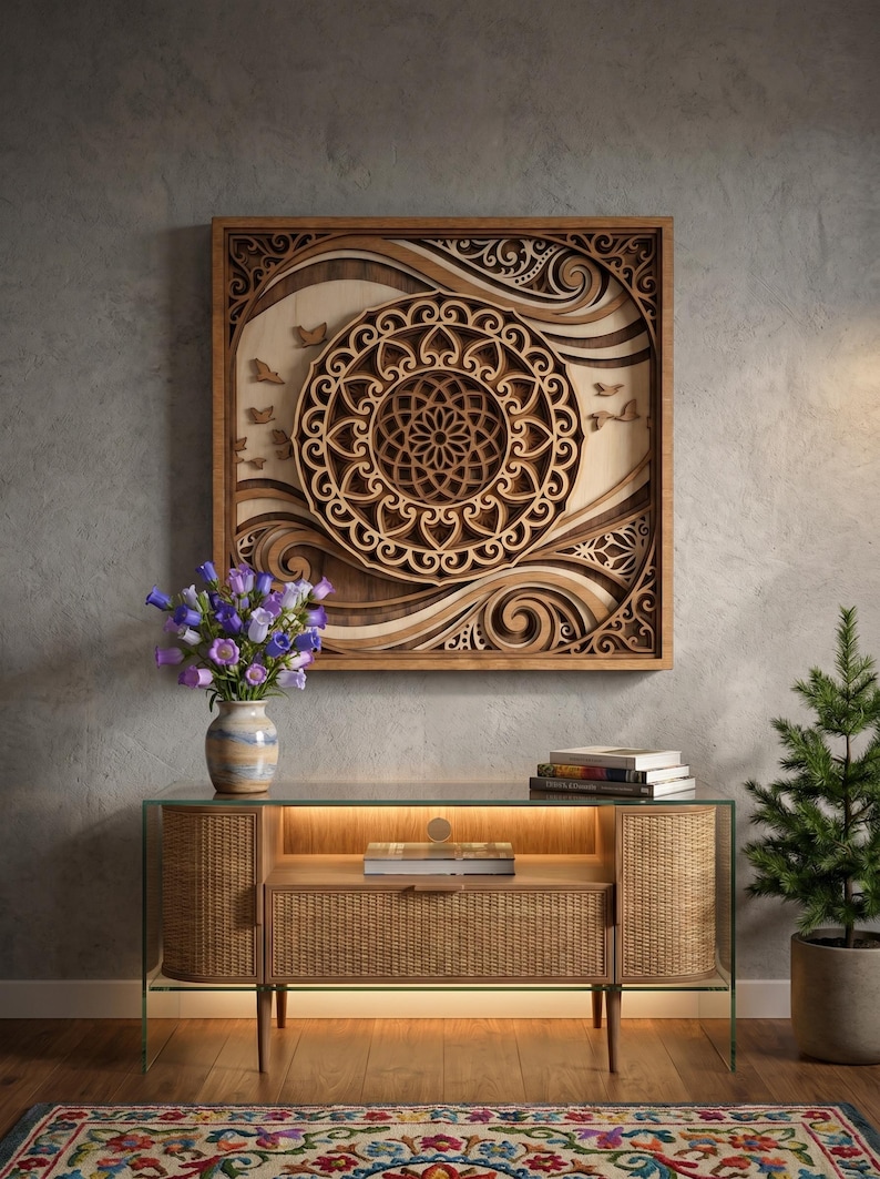 May include: A square wooden wall art piece featuring a layered mandala design with intricate cutouts, swirling patterns, and small bird silhouettes. The artwork is crafted from light and dark wood tones, creating a dimensional effect.