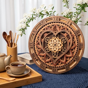 May include: A circular wooden wall clock featuring layered laser-cut designs, including a central mandala, heart-shaped frame, and mechanical gears. The clock face displays Roman numerals from I to XII in a dark wood finish with lighter wood accents.