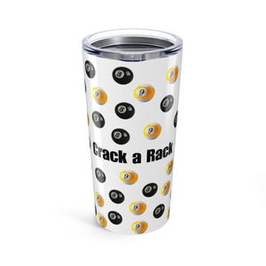 May include: White insulated tumbler with a black lid, featuring a pattern of black and yellow billiard balls. The text "Crack a Rack" is printed on the side. A fun accessory for pool players.