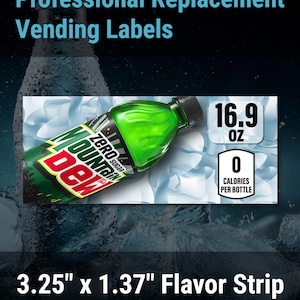 May include: A rectangular vending machine flavor strip measuring 3.25 inches by 1.37 inches, featuring a Mountain Dew Zero Sugar bottle graphic, 16.9 oz text, and a 0 calories per bottle label against a background of ice cubes.