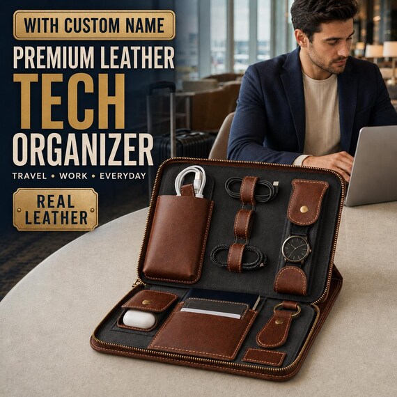 Genuine leather tech organizer with custom name stamping — the kind of cord-wrangling case that actually looks good sitting on a hotel desk.