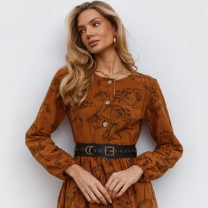 Elevate your look with our leather wide belt for women, handmade from premium leather. This waist cincher belt cute flatters your figure and adds bold style to any outfit. With an adjustable waist belt design, it fits comfortably under the bust and pairs beautifully with dresses. A stylish wide belt in rich brown—perfect for daily wear or gifting. Click “Add to Cart” and cinch your style today!