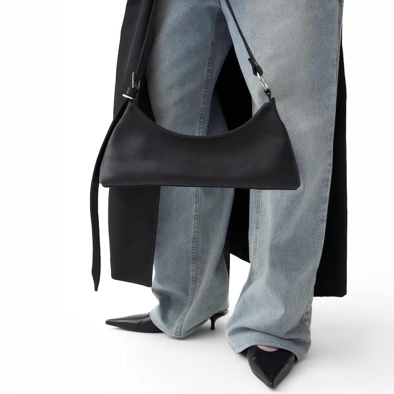 Discover timeless style with our women's leather shoulder bag small, a perfect blend of elegance and practicality. This handmade leather baguette bag features premium genuine leather, a secure zipper, and a sleek design to carry your essentials with ease. Ideal for everyday use or special occasions, this stylish leather bag adds sophistication to any outfit. Order now and elevate your look!