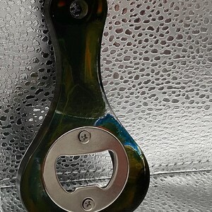 green and orange bottle opener