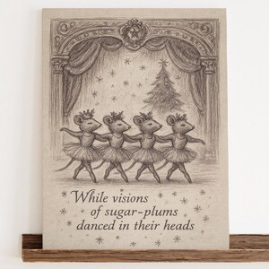 May include: A sepia-toned print featuring four mice in tutus dancing on a stage with a Christmas tree. The text reads "While visions of sugar-plums danced in their heads." The print is displayed on a wooden shelf.
