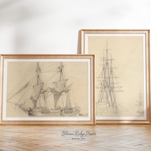 May include: Two framed vintage ship illustrations. The drawings are in monochrome, with detailed depictions of sailing vessels. The frames are a light wood colour, and the background is a neutral beige. The bottom of the image has the text "Bloom Ridge Prints DIGITAL ART".